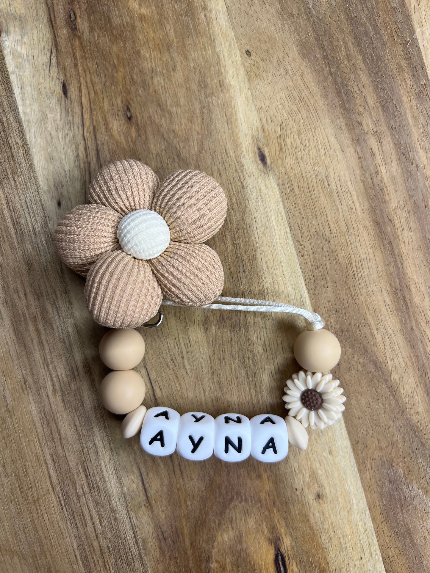 Attache tétine « Naya » taupe
